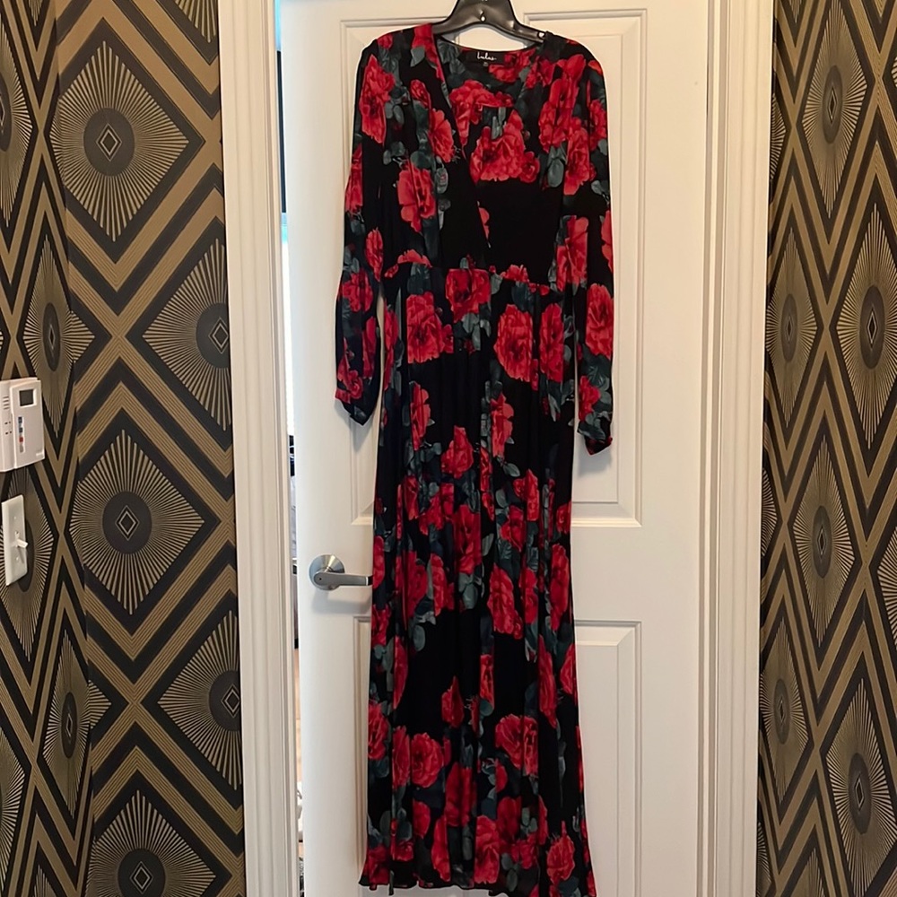 Floor length long sleeve dress with open shoulders and rose pattern